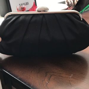 Black never used clutch with silver hardware